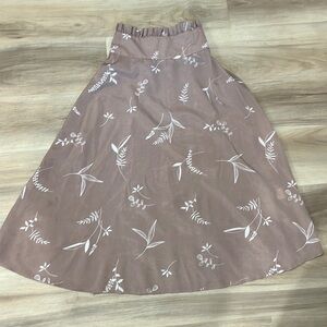 Tan floral skirt.